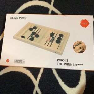 Brand new never used sling puck game